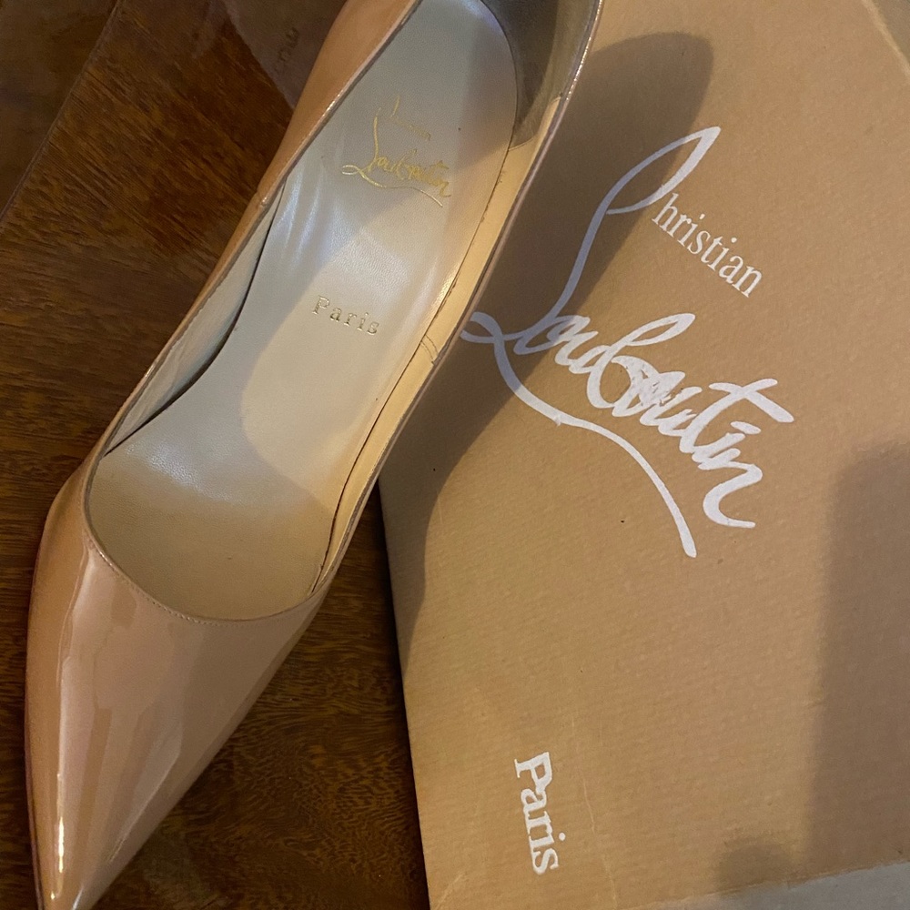 Christian Louboutin with shoe  protectors